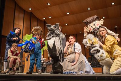 Image of Huntsville M.E.T. puppeteers on stage performing 